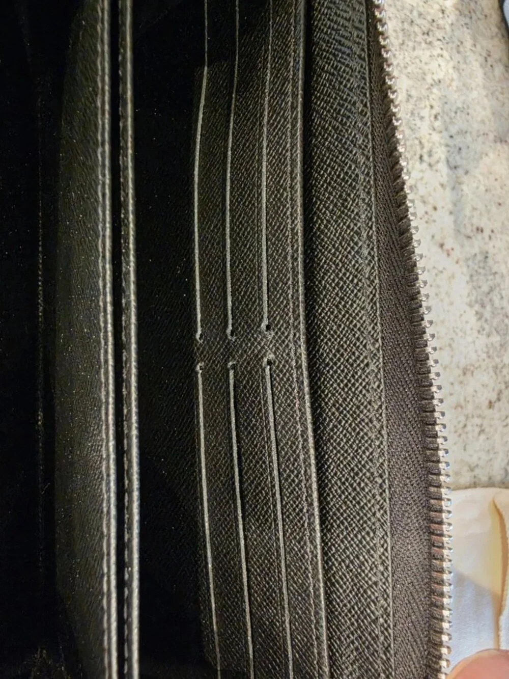 Authentic Louis Vuitton Zippy Wallet in Black Epi Leather